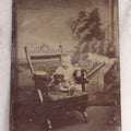 Lot 134 - Antique Uncased Tintype Photograph Of Seated Child Holding Small Dog