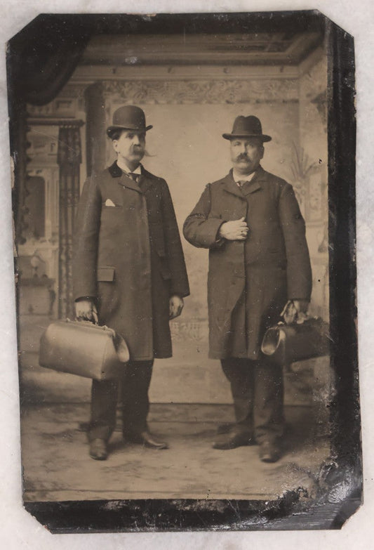 Lot 139 - Antique Uncased Tintype Photograph Of Two Men In Studio Interior Holding Doctor-Style Bags