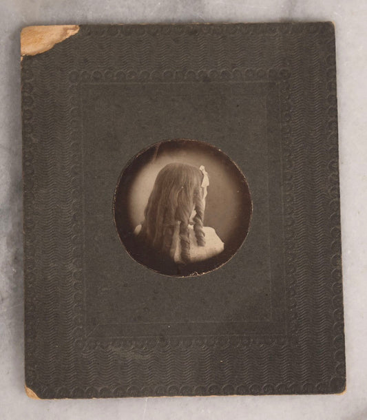 Lot 147 - Antique Small Size Boarded Photograph Of Young Girl With Curly Hair Viewed From The Back