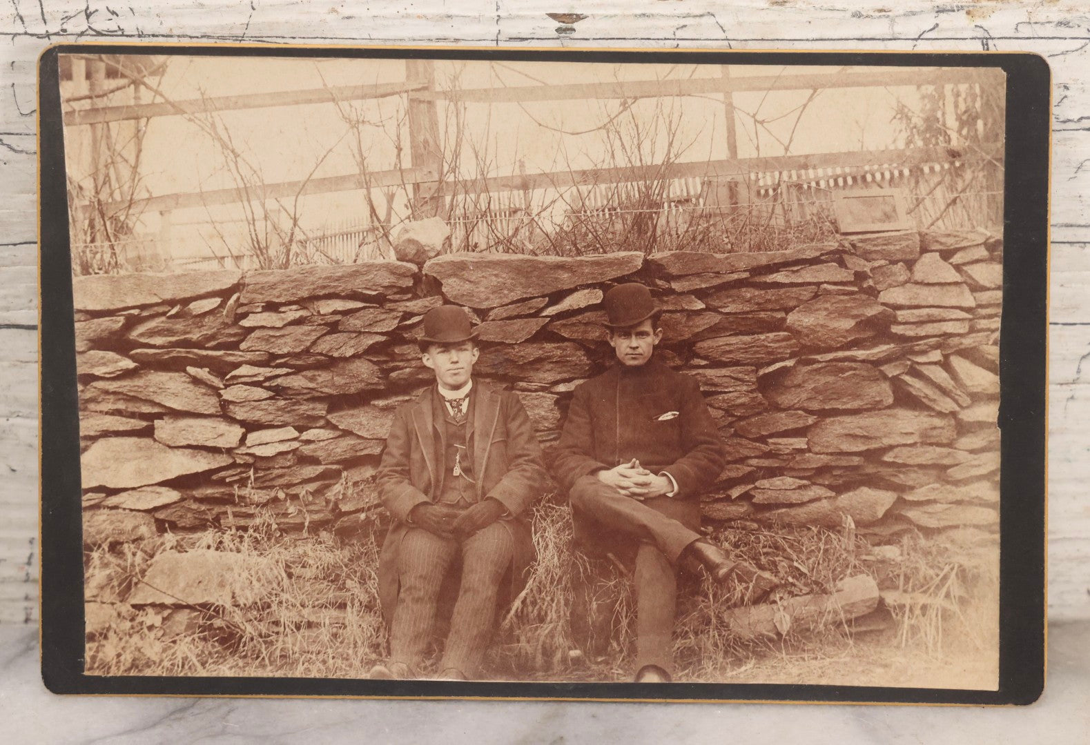 Lot 159 - Trio Of Antique Late 19th Century Boarded Outdoor Photographs Of Men Seated Along Rock Wall Including Duplicate Boudoir Cabinet Cards