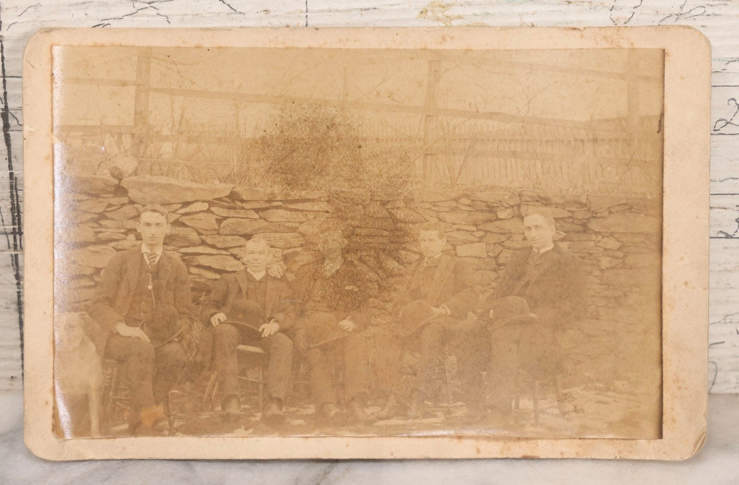 Lot 159 - Trio Of Antique Late 19th Century Boarded Outdoor Photographs Of Men Seated Along Rock Wall Including Duplicate Boudoir Cabinet Cards