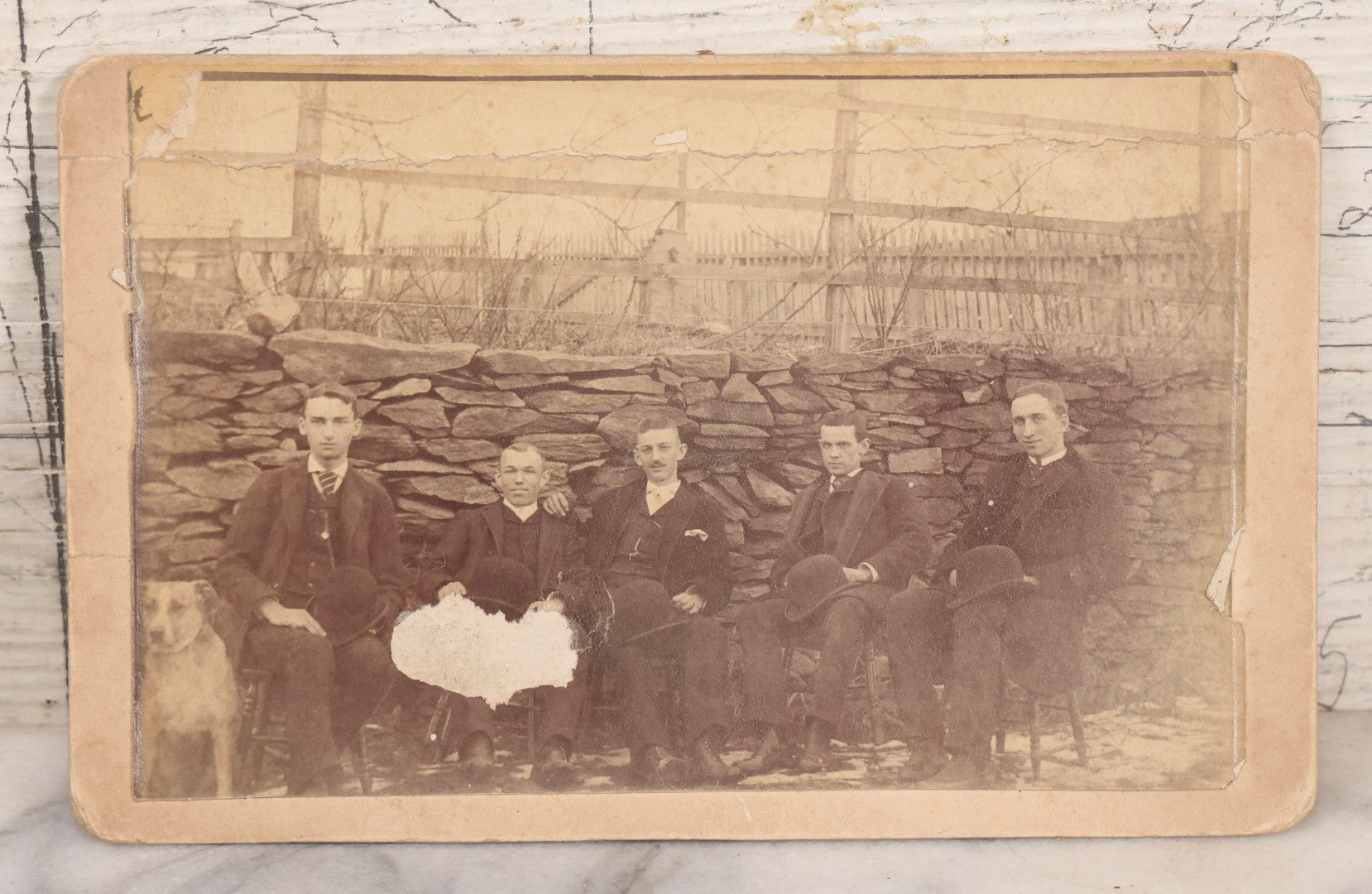 Lot 159 - Trio Of Antique Late 19th Century Boarded Outdoor Photographs Of Men Seated Along Rock Wall Including Duplicate Boudoir Cabinet Cards