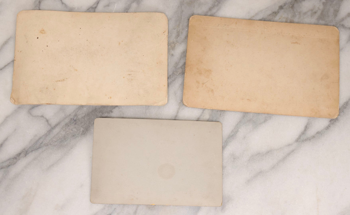 Lot 159 - Trio Of Antique Late 19th Century Boarded Outdoor Photographs Of Men Seated Along Rock Wall Including Duplicate Boudoir Cabinet Cards