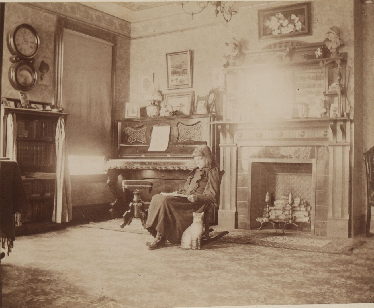 Lot 163 - Antique Boarded Interior Photograph Of Girl Identified As Ella In “Music Room” With Toy Cat, Dated April 30, 1893
