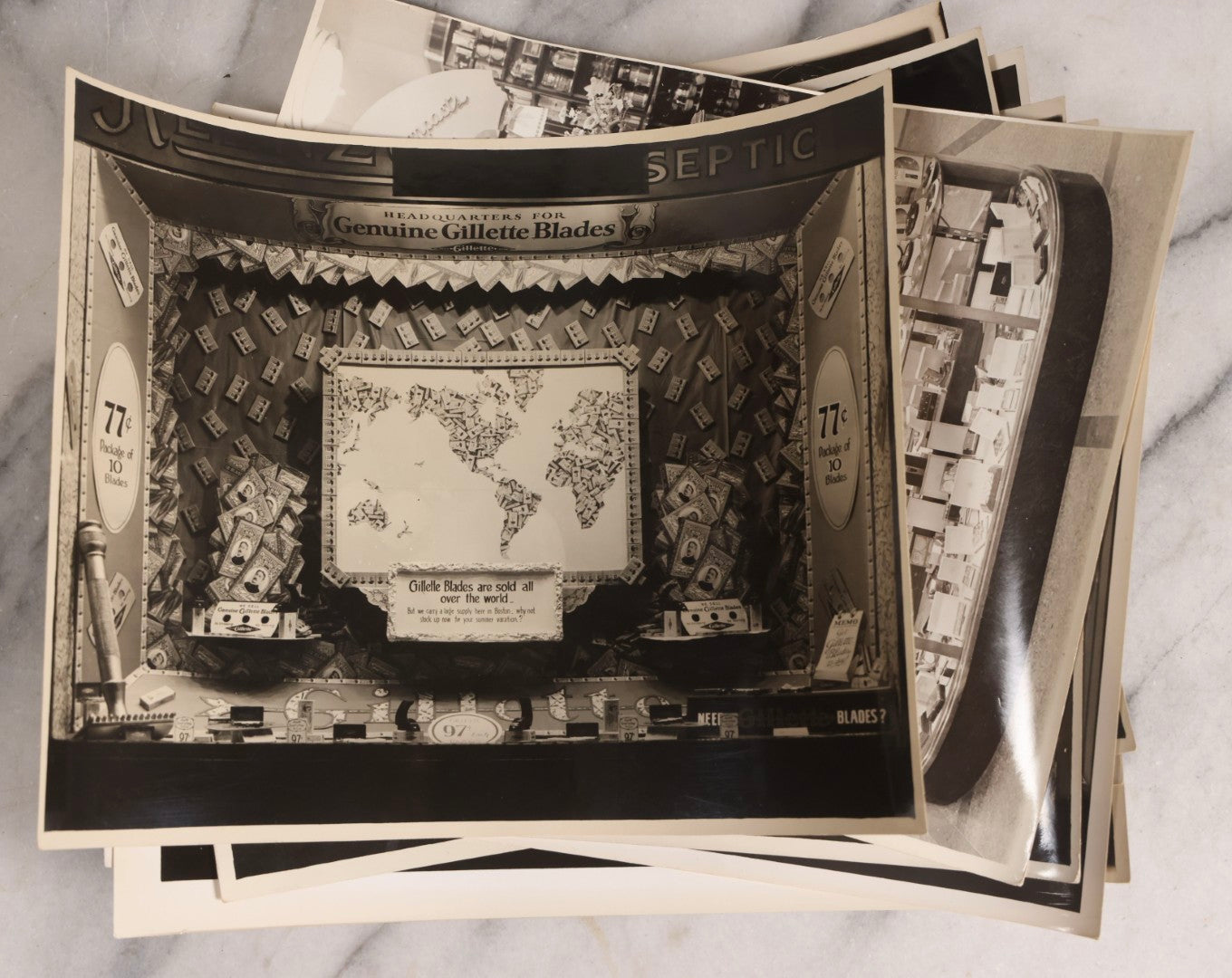 Lot 167 - Grouping Of 17 Glossy Unmounted Photographs Of Liggett's Rexall Store Window Advertising Displays, Circa 1940s