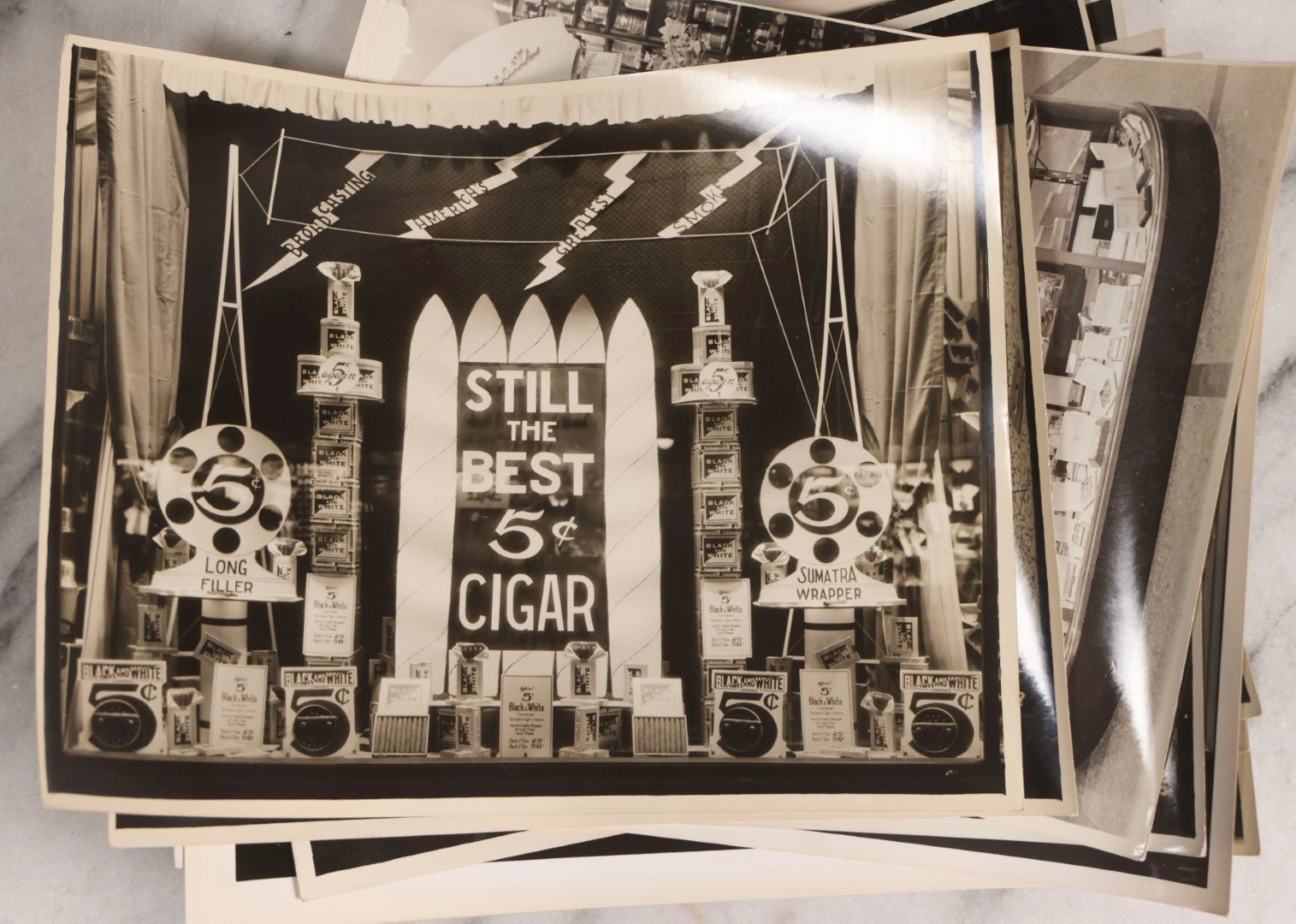 Lot 167 - Grouping Of 17 Glossy Unmounted Photographs Of Liggett's Rexall Store Window Advertising Displays, Circa 1940s