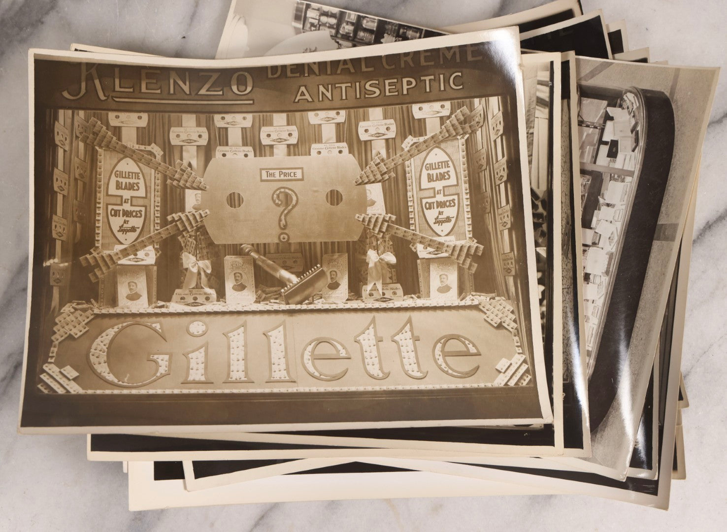 Lot 167 - Grouping Of 17 Glossy Unmounted Photographs Of Liggett's Rexall Store Window Advertising Displays, Circa 1940s