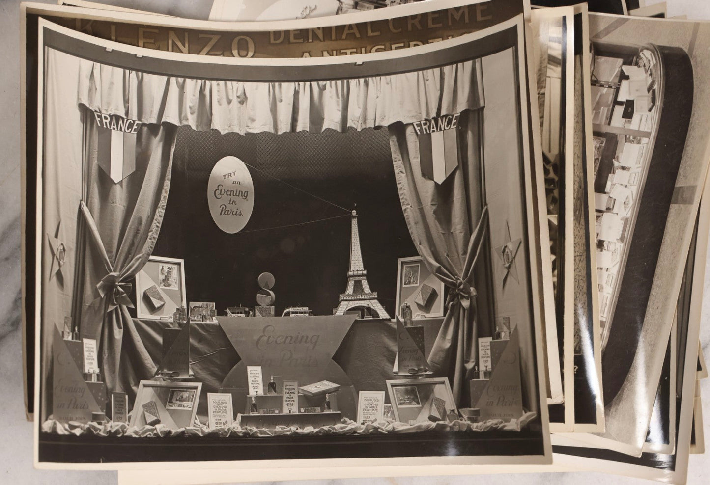 Lot 167 - Grouping Of 17 Glossy Unmounted Photographs Of Liggett's Rexall Store Window Advertising Displays, Circa 1940s