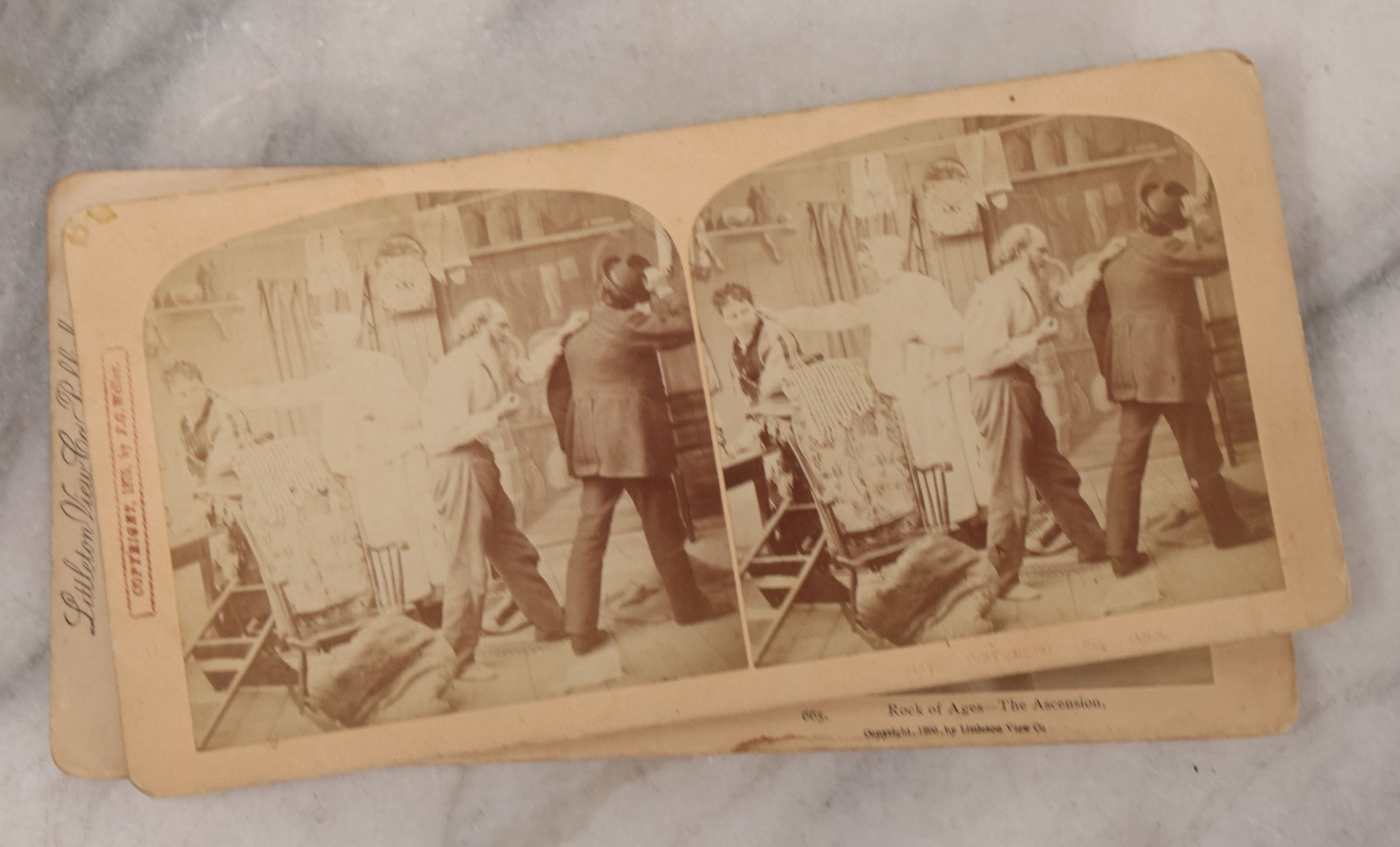 Lot 171 - Grouping Of 13 Antique Photographic Stereo View Cards Depicting Rock Of Ages, Comic Staged Scenes, Admiral Dewey Parade, Interior And Exterior Architecture, And Art
