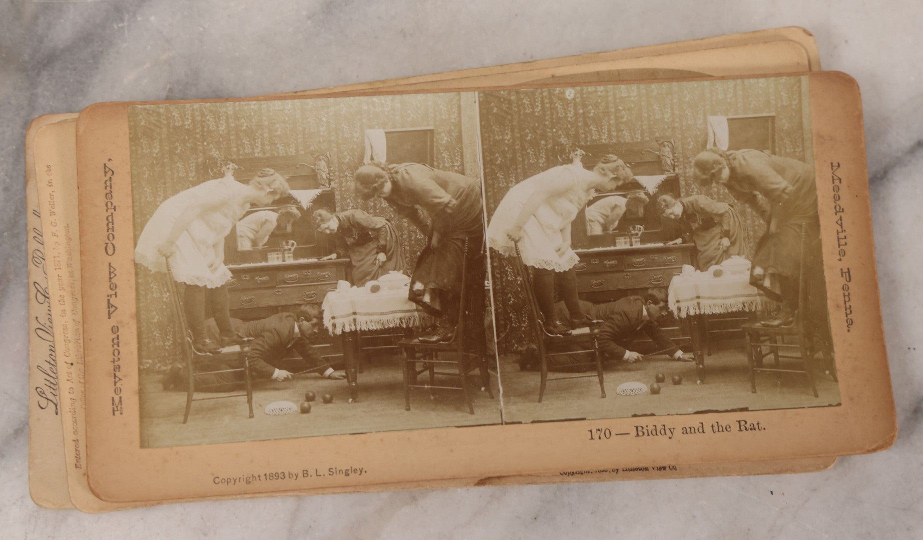 Lot 171 - Grouping Of 13 Antique Photographic Stereo View Cards Depicting Rock Of Ages, Comic Staged Scenes, Admiral Dewey Parade, Interior And Exterior Architecture, And Art