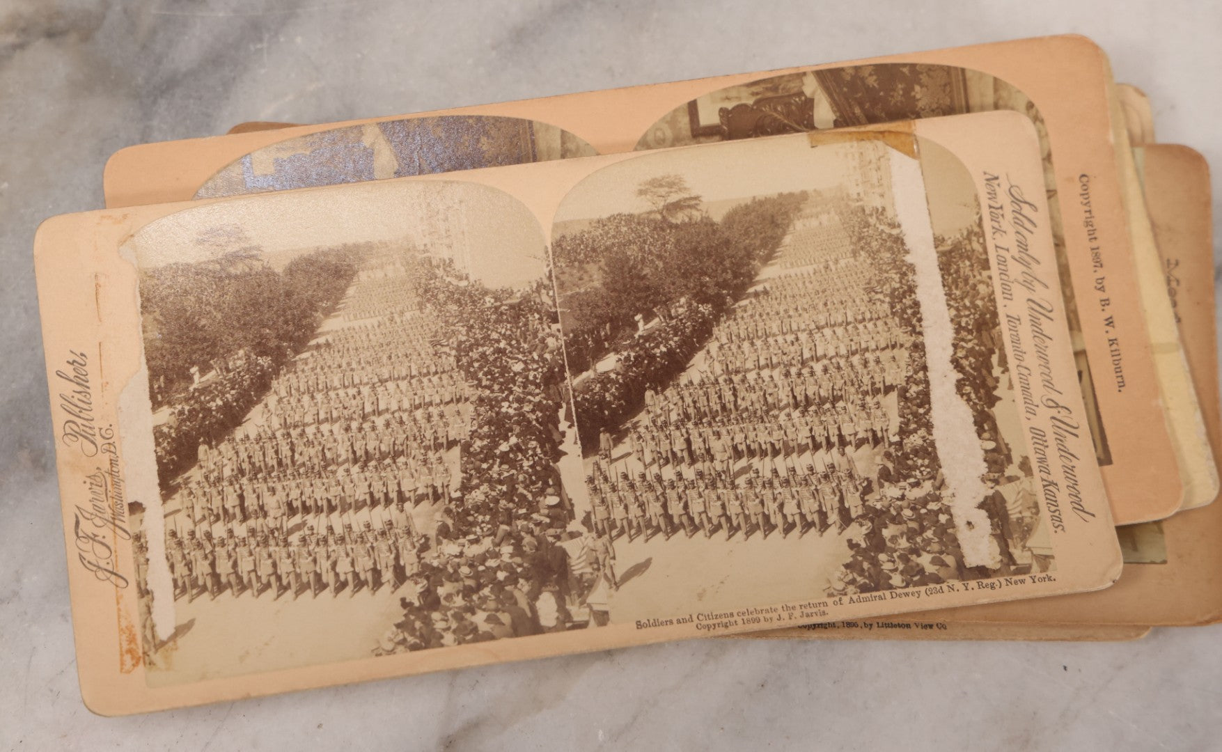 Lot 171 - Grouping Of 13 Antique Photographic Stereo View Cards Depicting Rock Of Ages, Comic Staged Scenes, Admiral Dewey Parade, Interior And Exterior Architecture, And Art