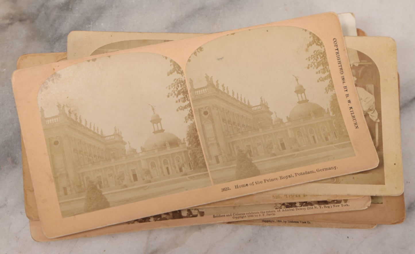Lot 171 - Grouping Of 13 Antique Photographic Stereo View Cards Depicting Rock Of Ages, Comic Staged Scenes, Admiral Dewey Parade, Interior And Exterior Architecture, And Art
