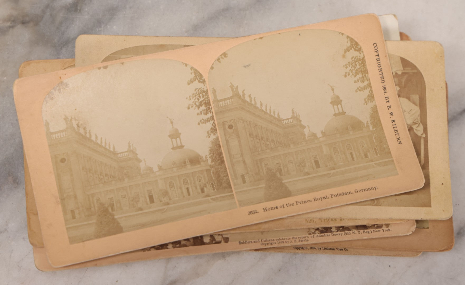 Lot 171 - Grouping Of 13 Antique Photographic Stereo View Cards Depicting Rock Of Ages, Comic Staged Scenes, Admiral Dewey Parade, Interior And Exterior Architecture, And Art