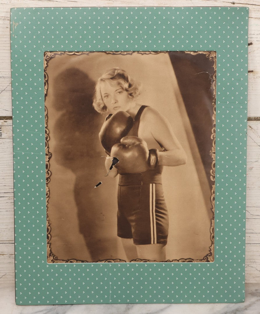 Lot 173 - Vintage Black And White Photograph Of Female Boxer Dorothy Mackaill In Blue Patterned Paper Frame, Likely Promotional Photo, Handwritten Pencil Identification On Verso, Note Small Tears And Holes Center Of Photo