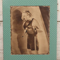 Lot 173 - Vintage Black And White Photograph Of Female Boxer Dorothy Mackaill In Blue Patterned Paper Frame, Likely Promotional Photo, Handwritten Pencil Identification On Verso, Note Small Tears And Holes Center Of Photo, 11" x 14"