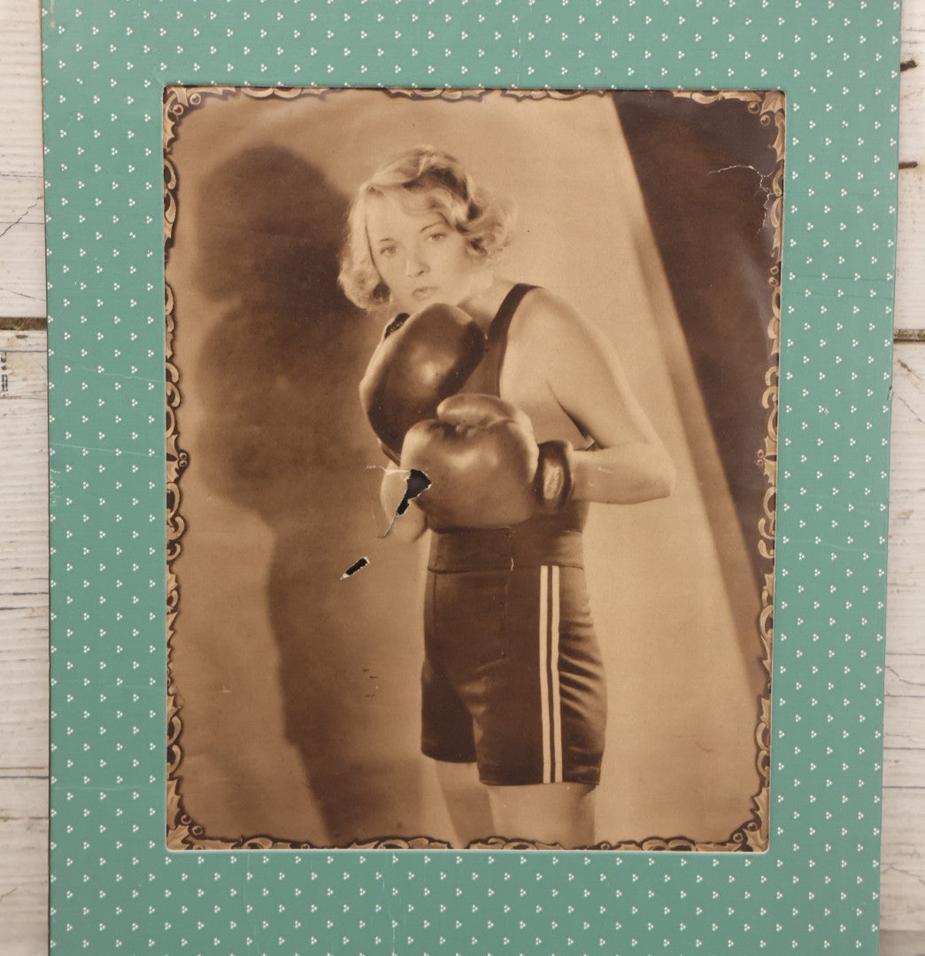 Lot 173 - Vintage Black And White Photograph Of Female Boxer Dorothy Mackaill In Blue Patterned Paper Frame, Likely Promotional Photo, Handwritten Pencil Identification On Verso, Note Small Tears And Holes Center Of Photo