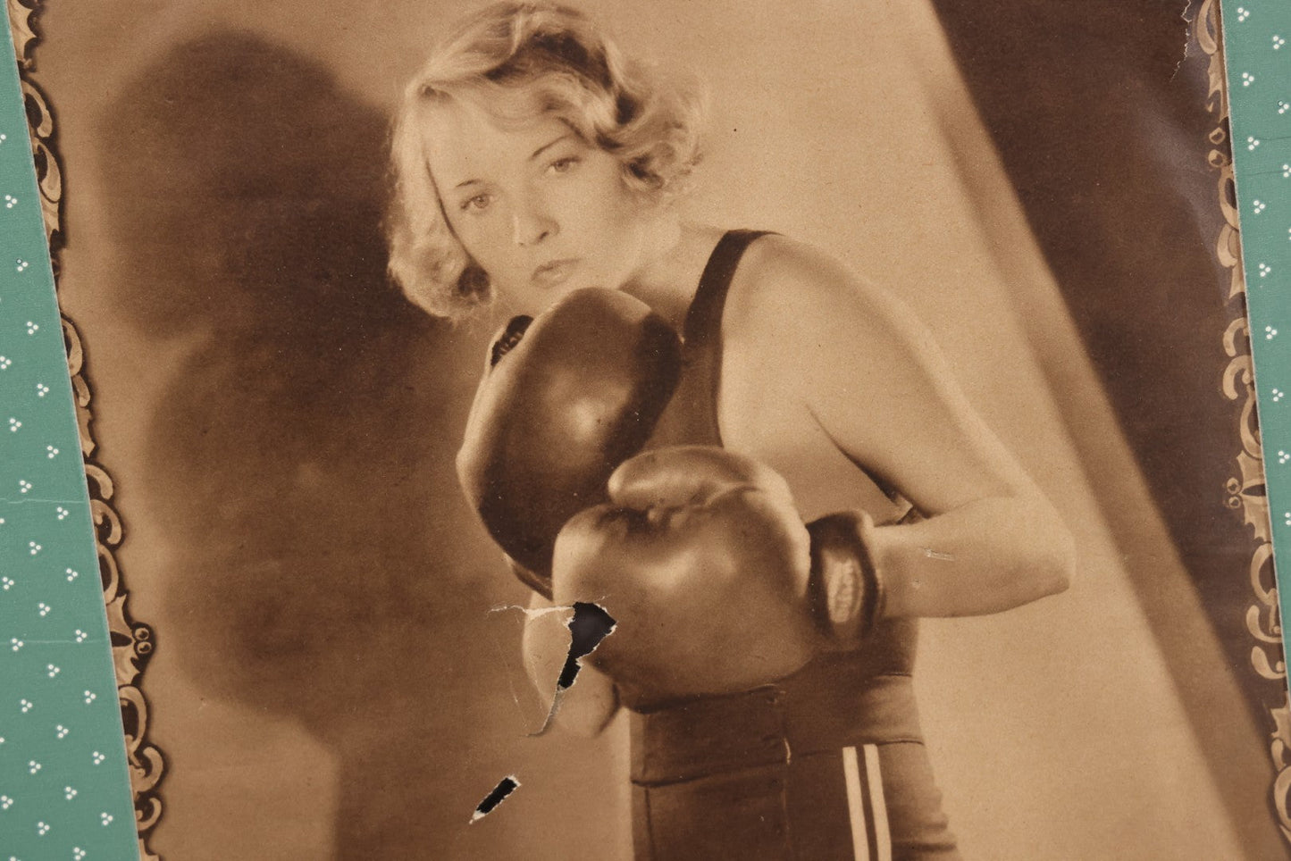 Lot 173 - Vintage Black And White Photograph Of Female Boxer Dorothy Mackaill In Blue Patterned Paper Frame, Likely Promotional Photo, Handwritten Pencil Identification On Verso, Note Small Tears And Holes Center Of Photo