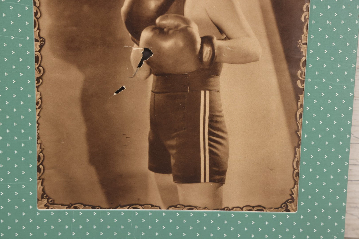 Lot 173 - Vintage Black And White Photograph Of Female Boxer Dorothy Mackaill In Blue Patterned Paper Frame, Likely Promotional Photo, Handwritten Pencil Identification On Verso, Note Small Tears And Holes Center Of Photo