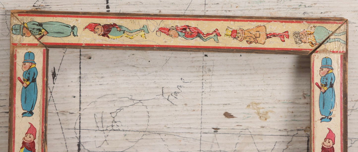Lot 180 - Antique Wooden Picture Frame With Applied Lithographed Paper Border Featuring Palmer Cox Brownies Illustrations
