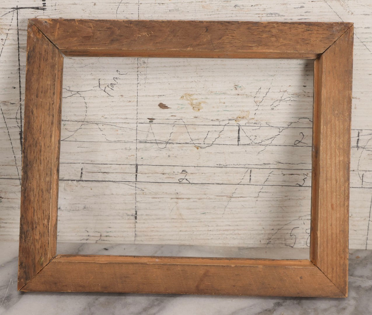 Lot 180 - Antique Wooden Picture Frame With Applied Lithographed Paper Border Featuring Palmer Cox Brownies Illustrations