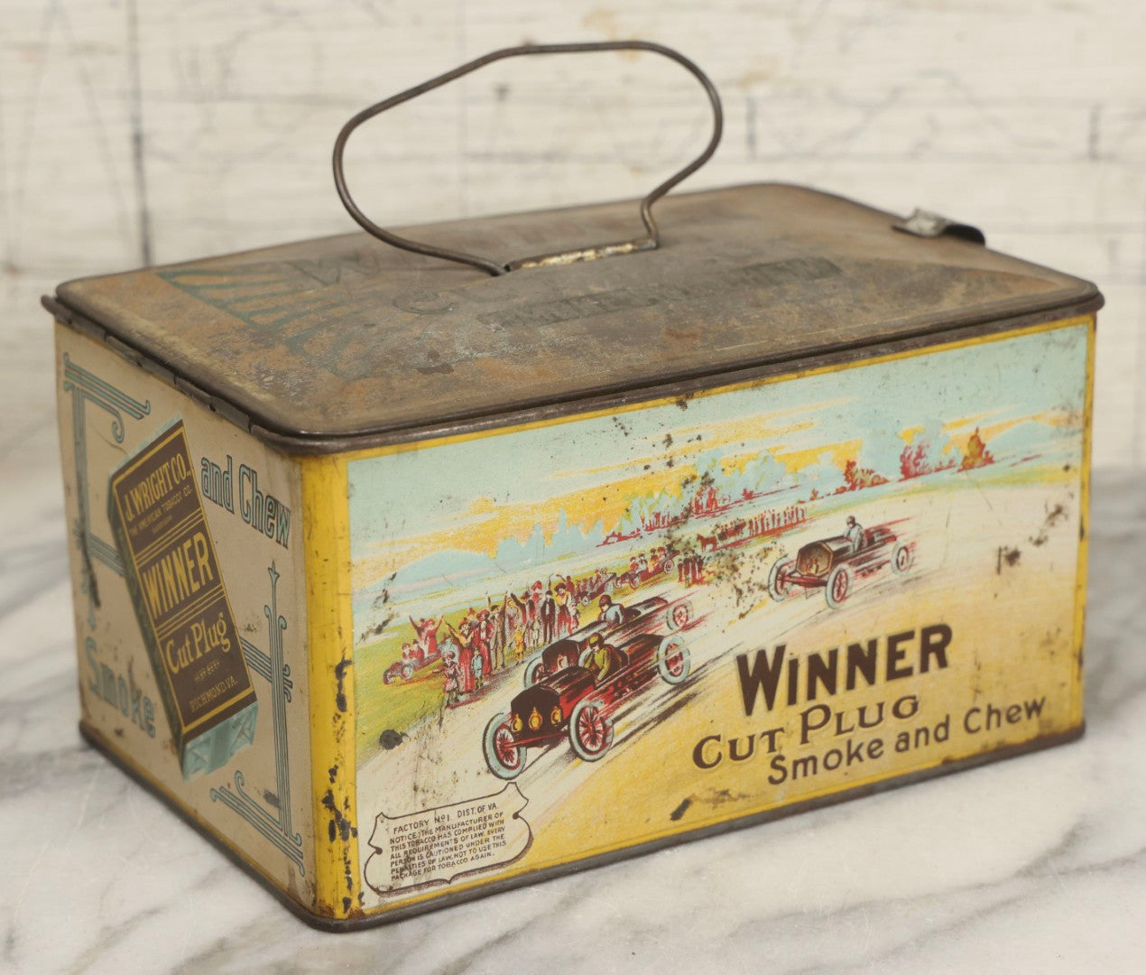 Lot 188 - Antique Tin Lithograph "Winner Cut Plug Smoke And Chew" Tobacco Tin With Auto Racing Motif, J. Wright Co., Richmond, Virginia, Circa 1910–1920
