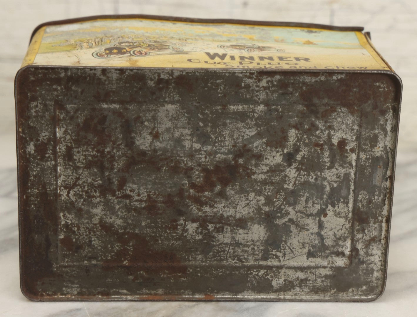 Lot 188 - Antique Tin Lithograph "Winner Cut Plug Smoke And Chew" Tobacco Tin With Auto Racing Motif, J. Wright Co., Richmond, Virginia, Circa 1910–1920