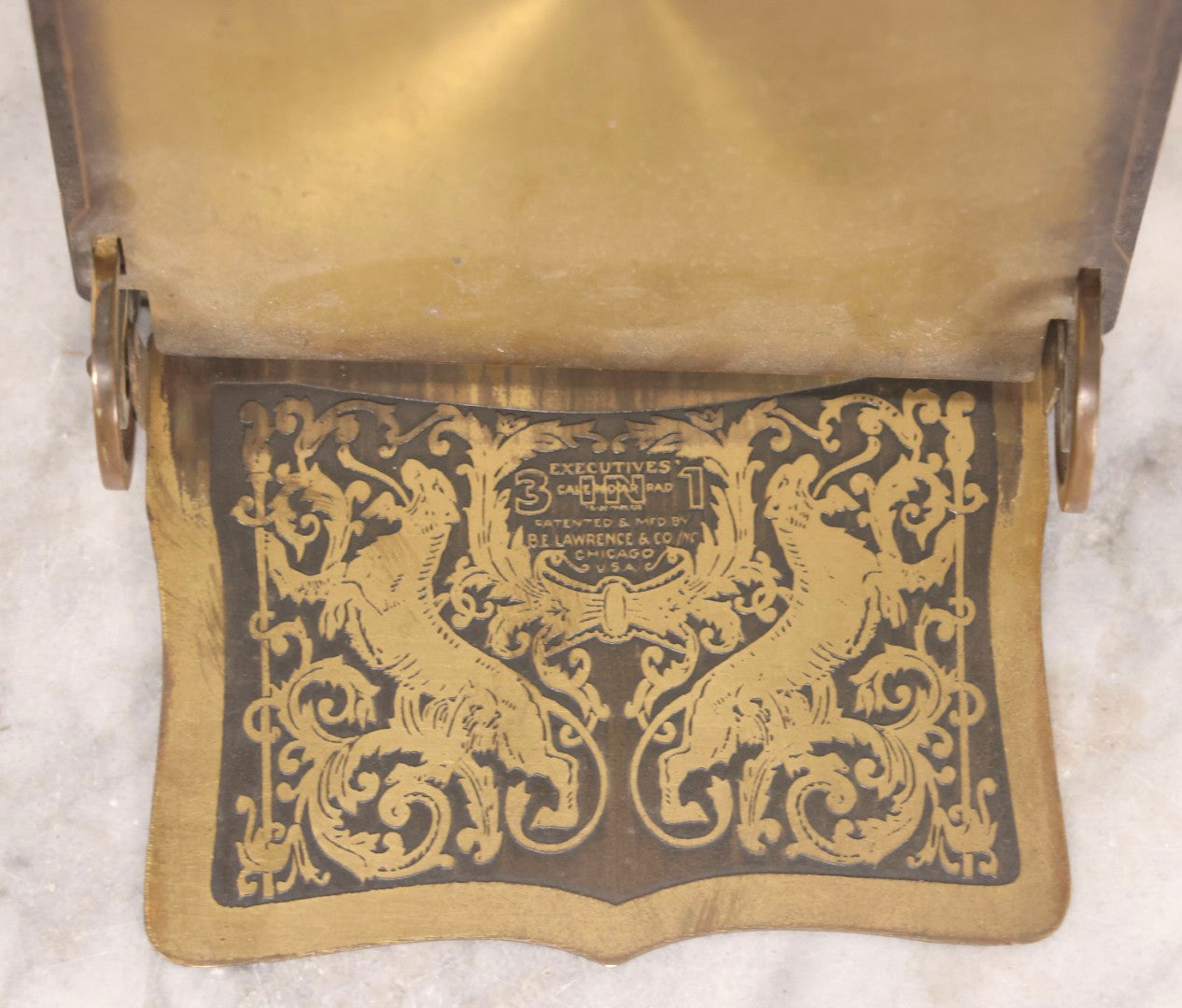 Lot 196 - Antique “Executives” 3-In-1 Desk Calendar Pad Holder With Ornate Brass And Metal Stand, Patented And Manufactured By B. E. Lawrence & Co., Chicago