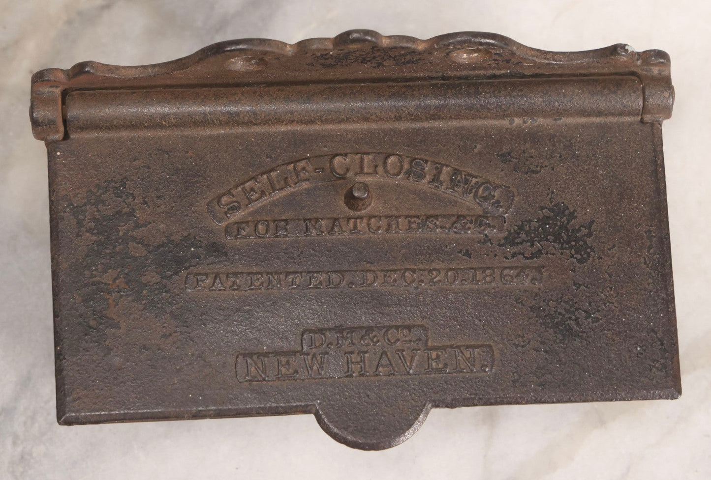 Lot 206 - Antique Cast Iron Self-Closing Match Safe, Patented December 20, 1864, D.M. & Co., New Haven, Connecticut