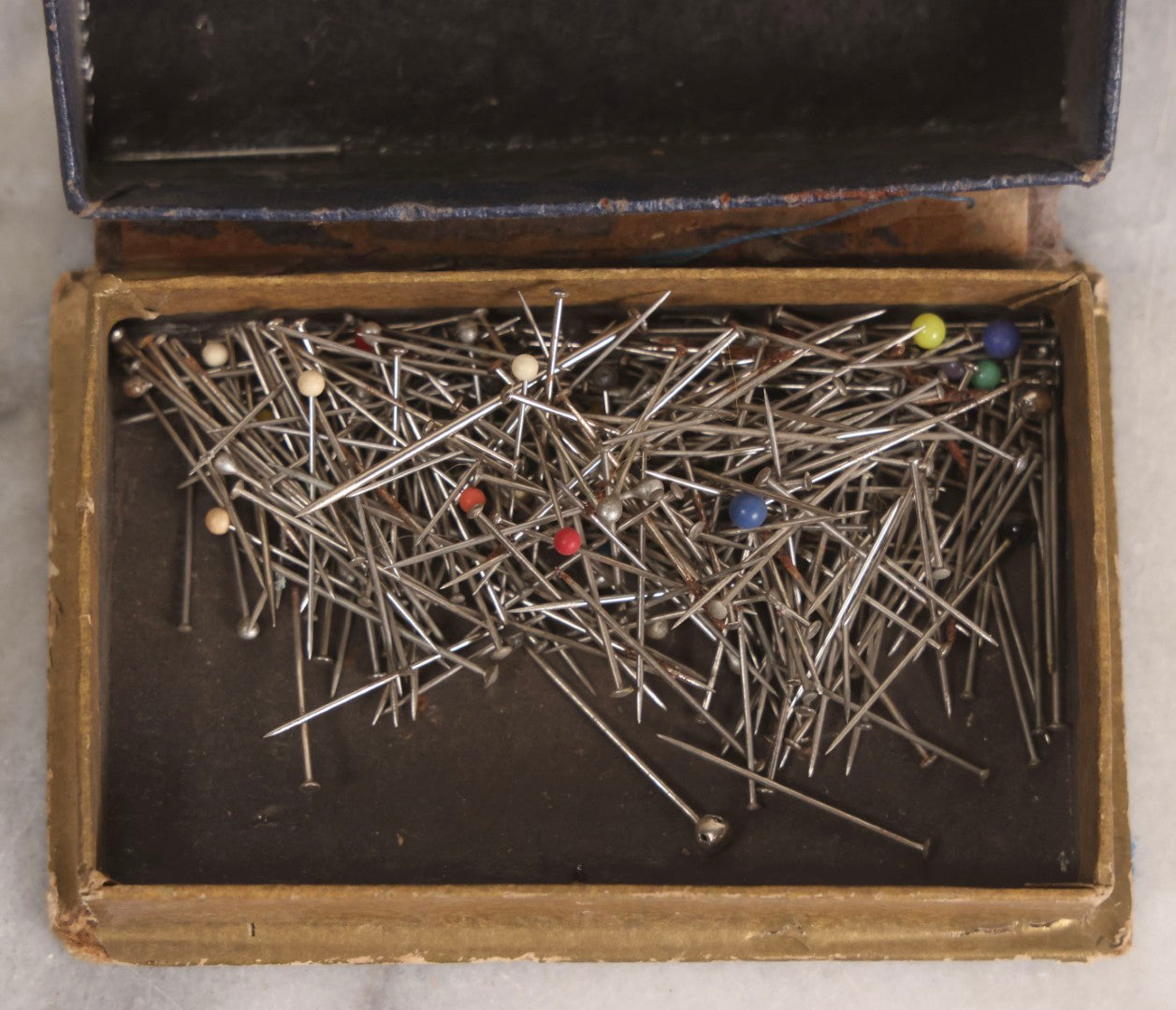 Lot 210 - Antique “The Patrician” Dressmakers Pins Box With Contents, Brass Rustproof Needle Points No. 16, Early 20th Century Sewing Notions Packaging, Original Cardboard Box With Wear