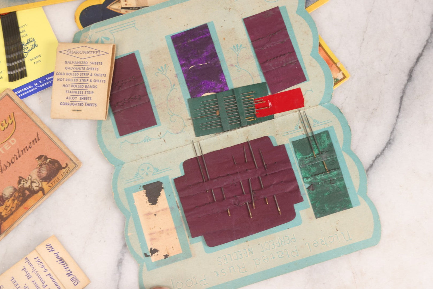 Lot 212 - Vintage Grouping Of 20+ Sewing Needle & Notions Card Lot Including Space Ship & Rocket Brand Needle Folders, Bobbie Smith Bobbie Pins, And Other Vintage Sewing Cards