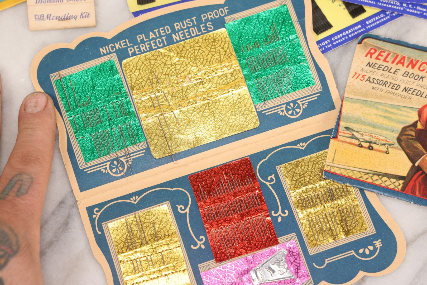 Lot 212 - Vintage Grouping Of 20+ Sewing Needle & Notions Card Lot Including Space Ship & Rocket Brand Needle Folders, Bobbie Smith Bobbie Pins, And Other Vintage Sewing Cards