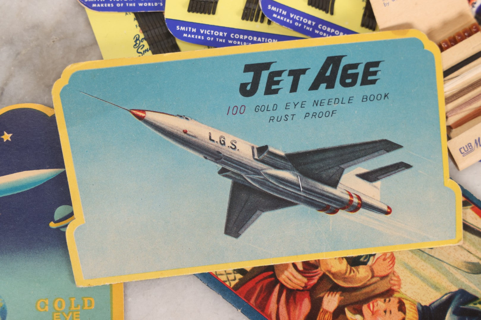 Lot 212 - Vintage Grouping Of 20+ Sewing Needle & Notions Card Lot Including Space Ship & Rocket Brand Needle Folders, Bobbie Smith Bobbie Pins, And Other Vintage Sewing Cards