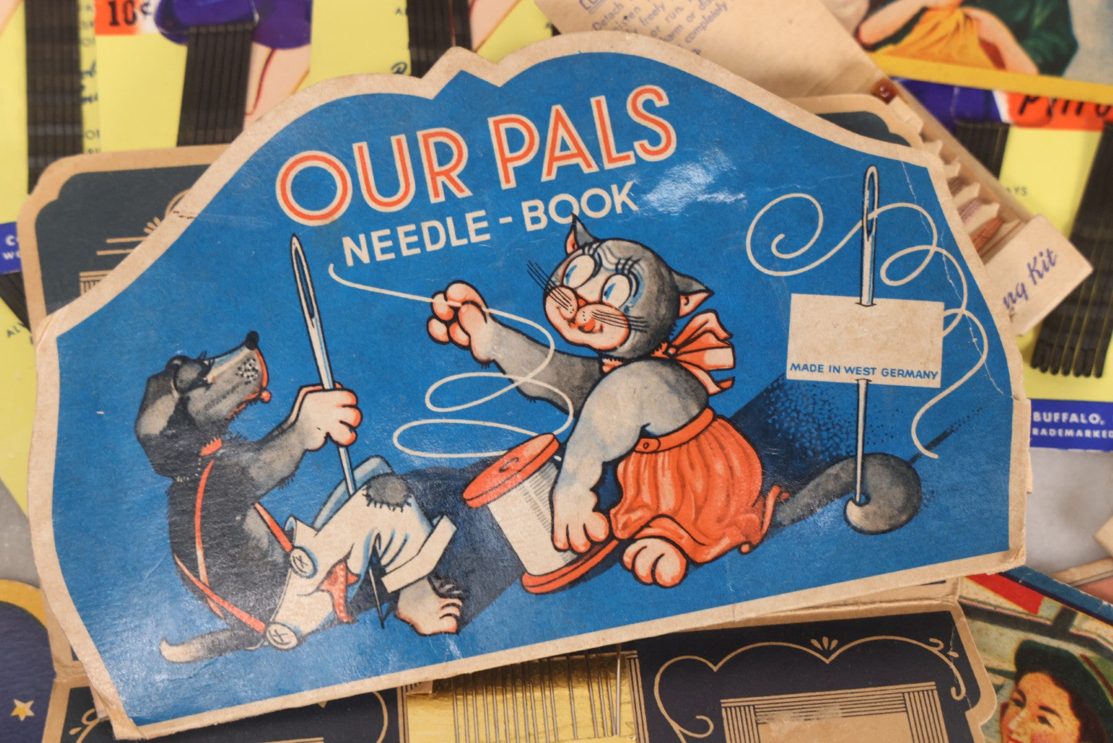 Lot 212 - Vintage Grouping Of 20+ Sewing Needle & Notions Card Lot Including Space Ship & Rocket Brand Needle Folders, Bobbie Smith Bobbie Pins, And Other Vintage Sewing Cards