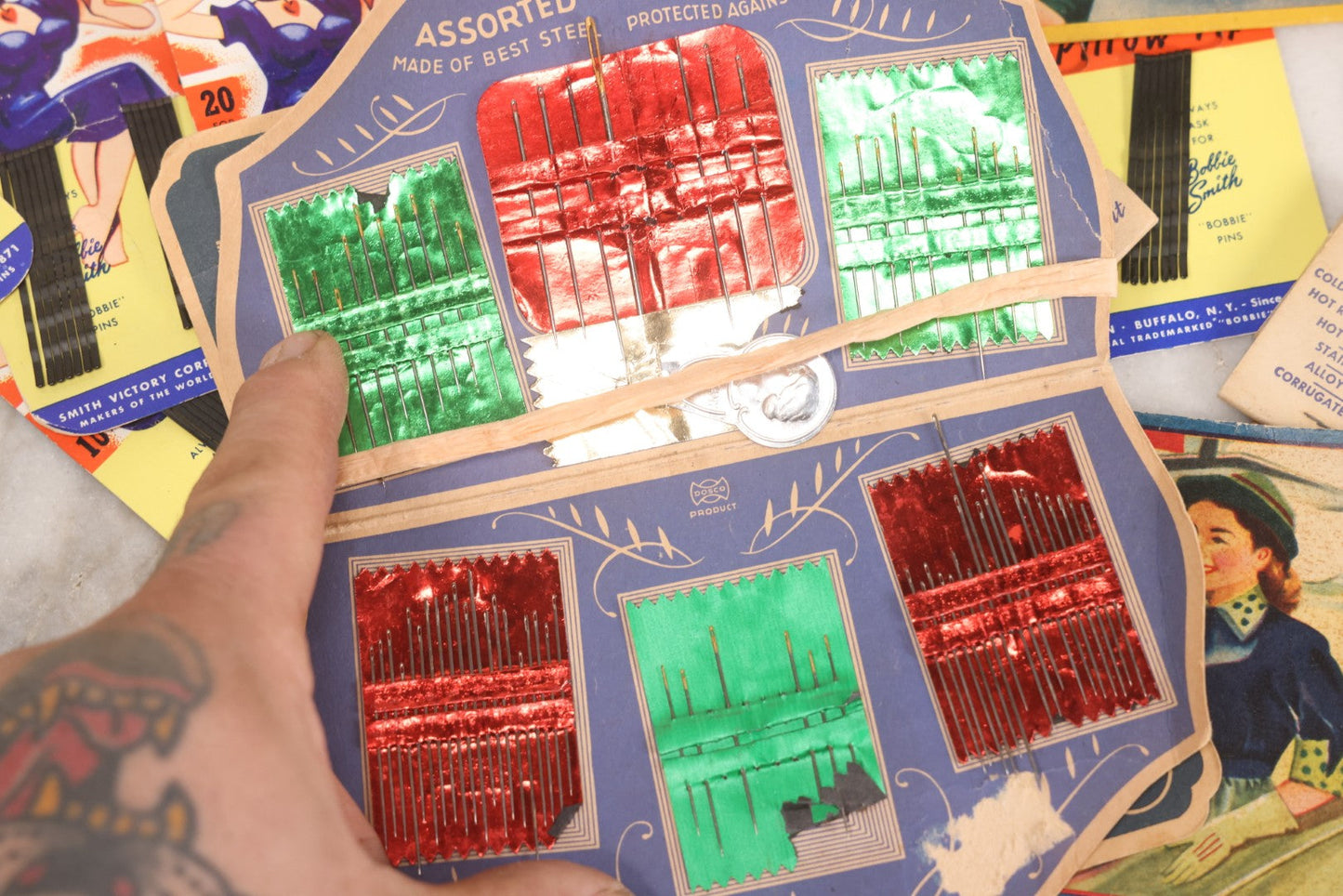 Lot 212 - Vintage Grouping Of 20+ Sewing Needle & Notions Card Lot Including Space Ship & Rocket Brand Needle Folders, Bobbie Smith Bobbie Pins, And Other Vintage Sewing Cards