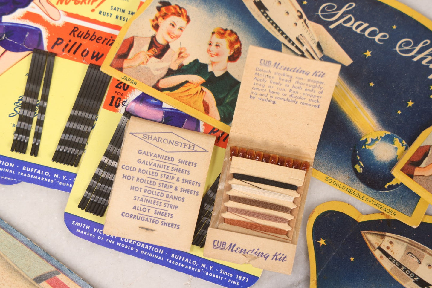 Lot 212 - Vintage Grouping Of 20+ Sewing Needle & Notions Card Lot Including Space Ship & Rocket Brand Needle Folders, Bobbie Smith Bobbie Pins, And Other Vintage Sewing Cards