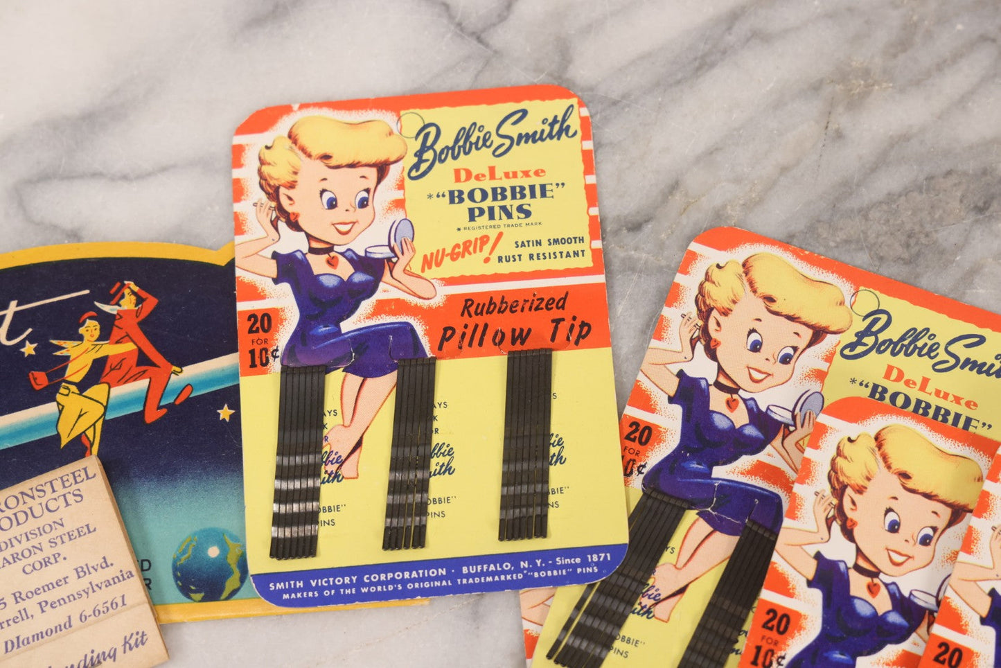 Lot 212 - Vintage Grouping Of 20+ Sewing Needle & Notions Card Lot Including Space Ship & Rocket Brand Needle Folders, Bobbie Smith Bobbie Pins, And Other Vintage Sewing Cards