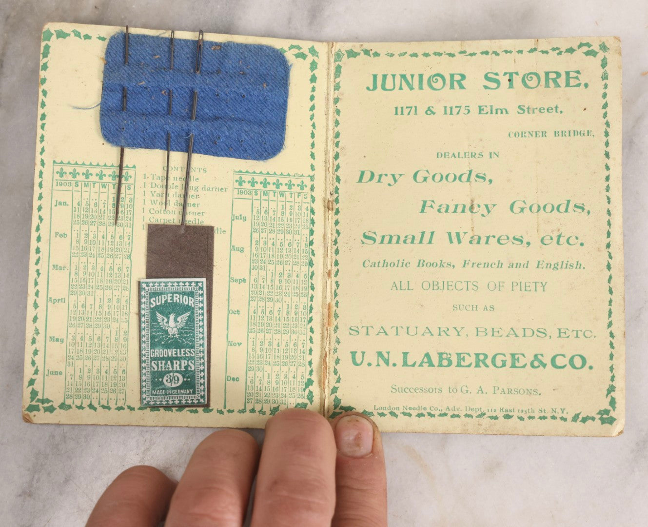 Lot 218 - Antique Metamorphic Needle Book With Optical Illusion Graphics, U.N. Laberge & Co. “Junior Store,” Manchester, New Hampshire, Circa 1903, With Original Needles