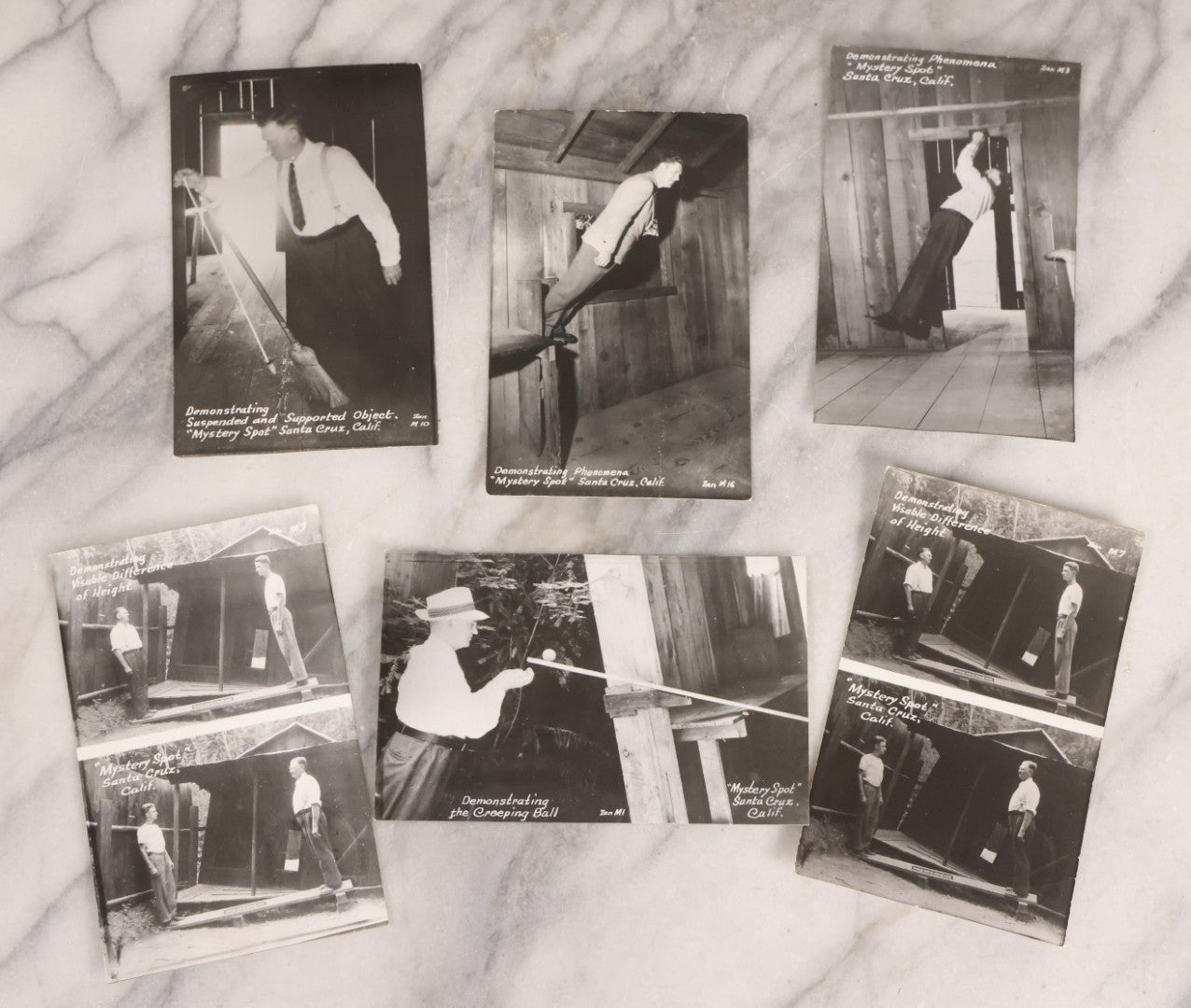 Lot 228 - Grouping Of Six Vintage Souvenir Photo Postcards Depicting Demonstrated Phenomena At The Mystery Spot, Santa Cruz, California