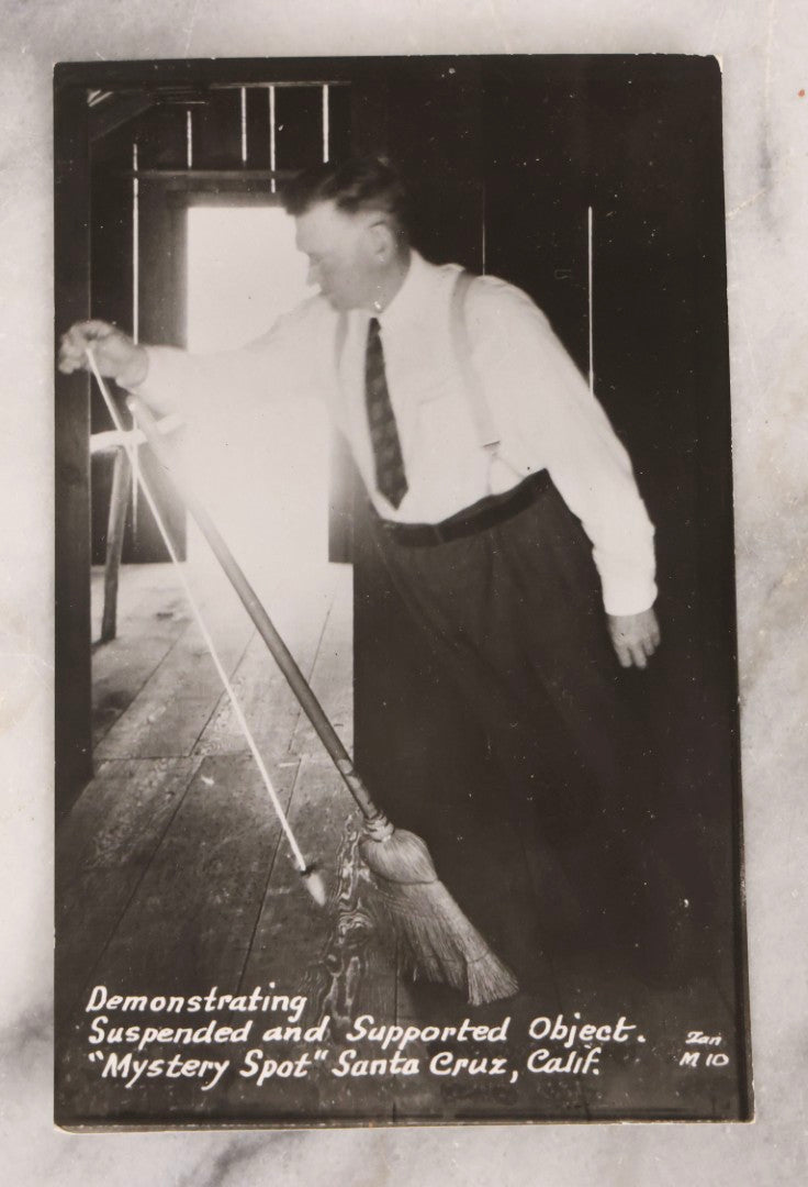 Lot 228 - Grouping Of Six Vintage Souvenir Photo Postcards Depicting Demonstrated Phenomena At The Mystery Spot, Santa Cruz, California