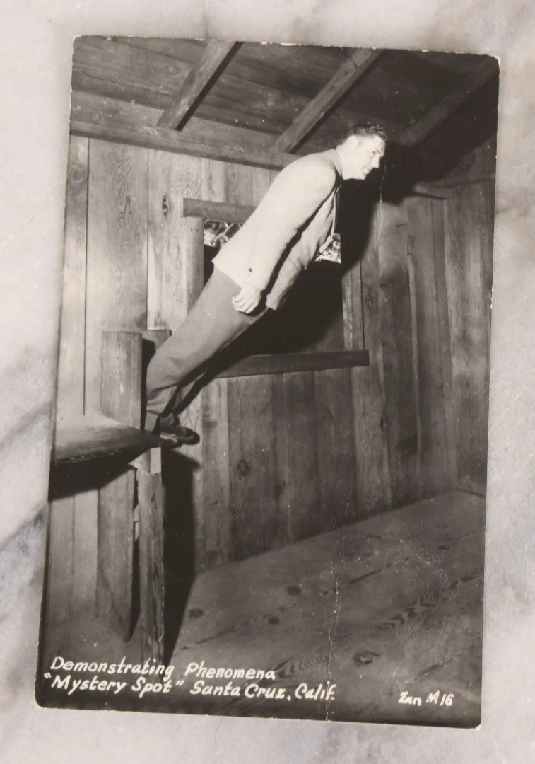 Lot 228 - Grouping Of Six Vintage Souvenir Photo Postcards Depicting Demonstrated Phenomena At The Mystery Spot, Santa Cruz, California