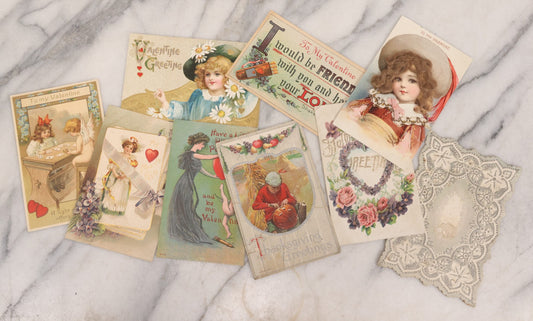 Lot 236 - Grouping Of Nine Antique Valentine And Holiday Postcards, Including One With Real Hair Applied, Paper Lace, Gilt Accents, And Thanksgiving Card Depicting Jack-O-Lantern J.O.L. Carving