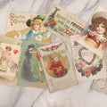 Lot 236 - Grouping Of Nine Antique Valentine And Holiday Postcards, Including One With Real Hair Applied, Paper Lace, Gilt Accents, And Thanksgiving Card Depicting Jack-O-Lantern J.O.L. Carving