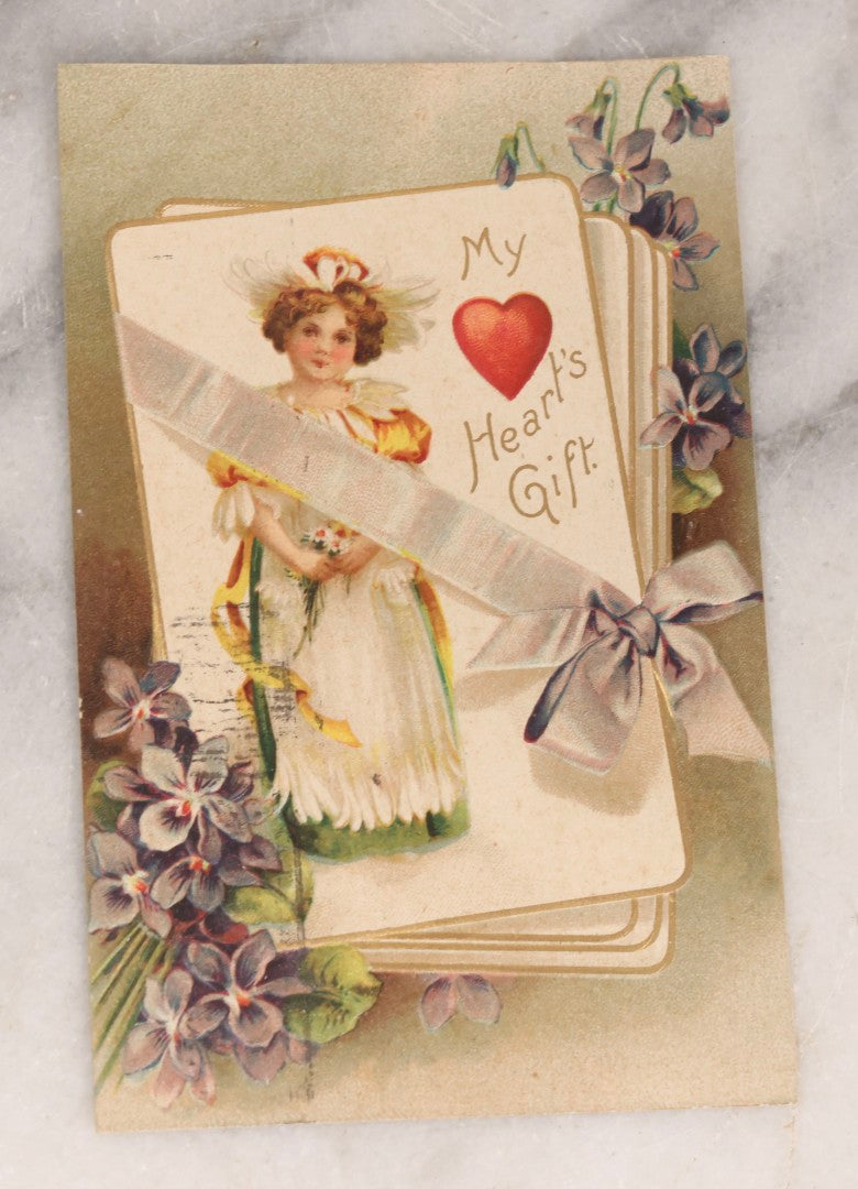 Lot 236 - Grouping Of Nine Antique Valentine And Holiday Postcards, Including One With Real Hair Applied, Paper Lace, Gilt Accents, And Thanksgiving Card Depicting Jack-O-Lantern J.O.L. Carving