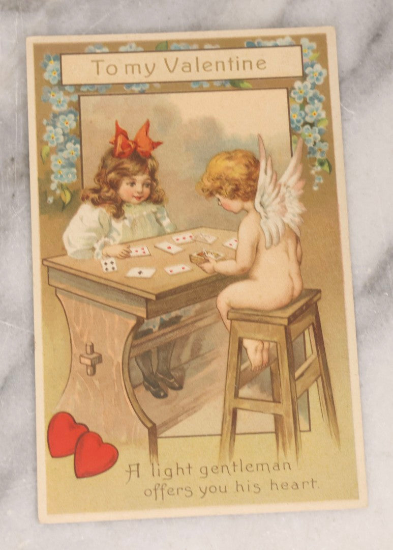 Lot 236 - Grouping Of Nine Antique Valentine And Holiday Postcards, Including One With Real Hair Applied, Paper Lace, Gilt Accents, And Thanksgiving Card Depicting Jack-O-Lantern J.O.L. Carving