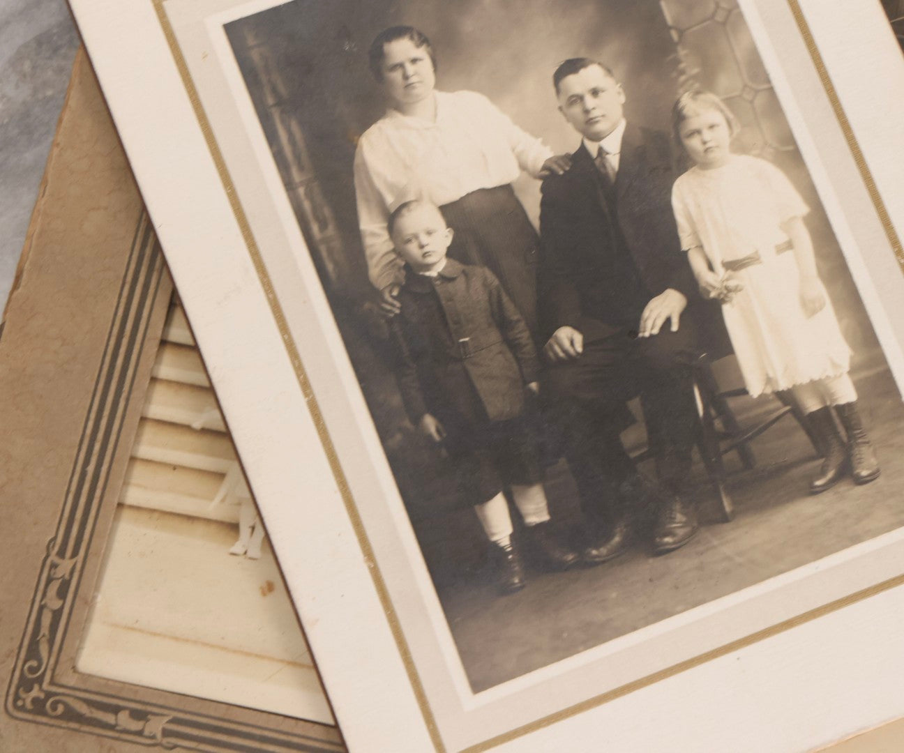 Lot 238 - Grouping Of Six Antique And Vintage Photographs Including Real Photo Postcard R.P.P.C.. Of Farm Equipment, First Communion Class Foldered Group Photograph, And Portrait Studies