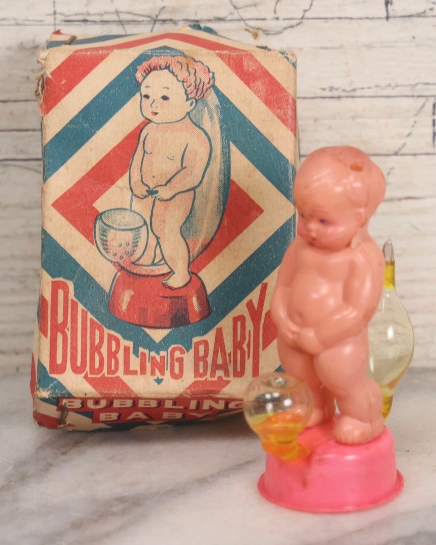 Lot 260 - Vintage "Bubbling Baby" Novelty Plastic Peeing Baby Toy In Original Box
