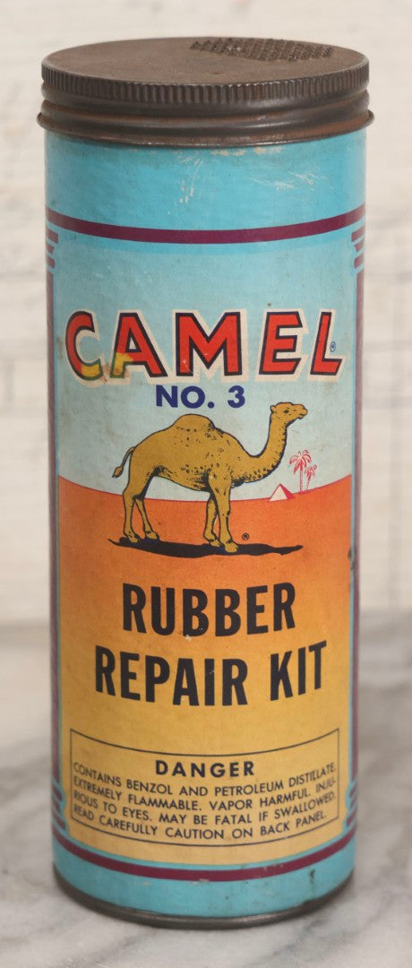 Lot 262 - Trio Of Vintage And Antique Advertising Pieces Including Grass Seed Tin, Camel Tire Tube Repair Kit, And “Little General Infants Durable Hose” Undergarments Box, W.T. Grant Co., 1923