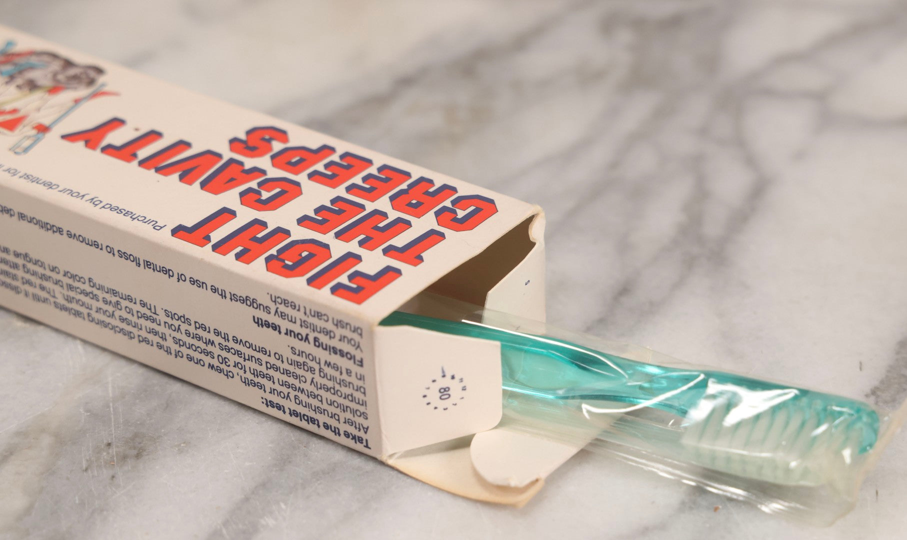 Lot 270 - Grouping Of Four Vintage Children's Advertising Pieces Including Carnival Straws Clown Box, Cra-O-Tec No. 116 Crayons, Popeye And Friends Amscan Drinking Cups, And "Fight The Cavity Creeps" Crest Toothbrush Box By Procter And Gamble