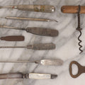 Lot 273 - Grouping Of Nine Vintage Metal Tools And Advertising Pieces Including Screwdrivers From Hastings Co-Operative Elevator, Dayton Scale, Lindsay Bros. Co., And Hoover, Dental Tools, Piel's Beer Opener, And Corkscrew