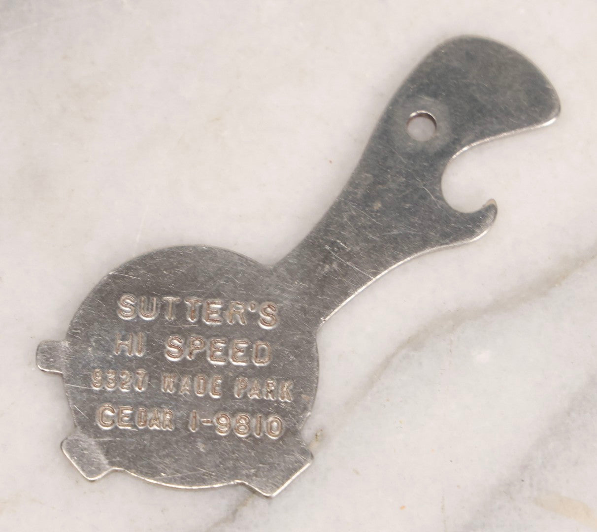 Lot 274 - Grouping Of 13 Vintage Advertising And Metal Pieces Including Ford And Studebaker Keys, Sutter's Hi Speed Turtle Bottle Opener, Acme Thunderer Whistles, S.S. Kresge Co. Feeler Gauge, And Shell Service Scraper